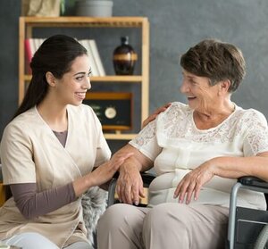 Home Helpers caregiver with Alzheimer's patient
